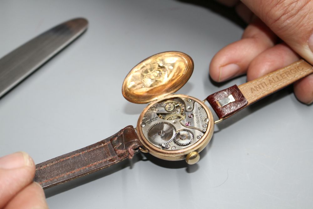 A gentlemans 1920s 9ct. gold manual wind wristwatch, with case back inscription.